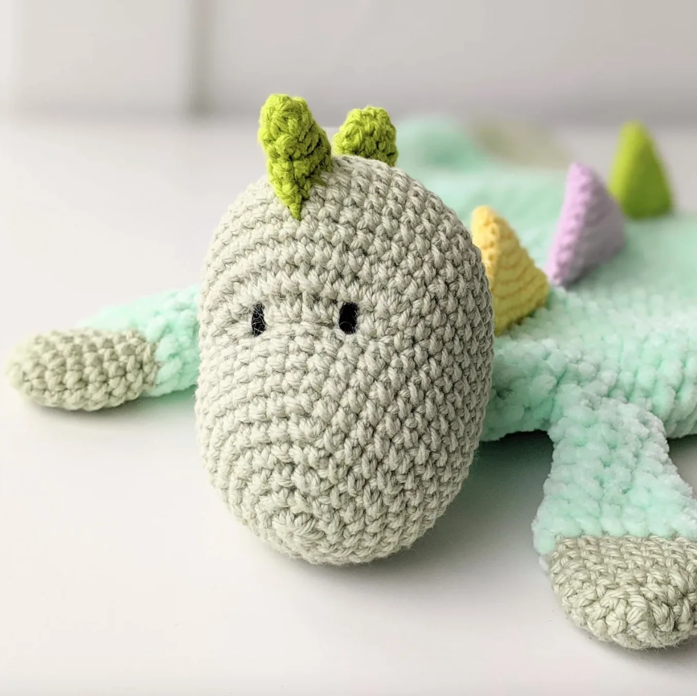 Cuddly Dinosaur Comforter